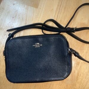 Small coach bag with adjustable strap